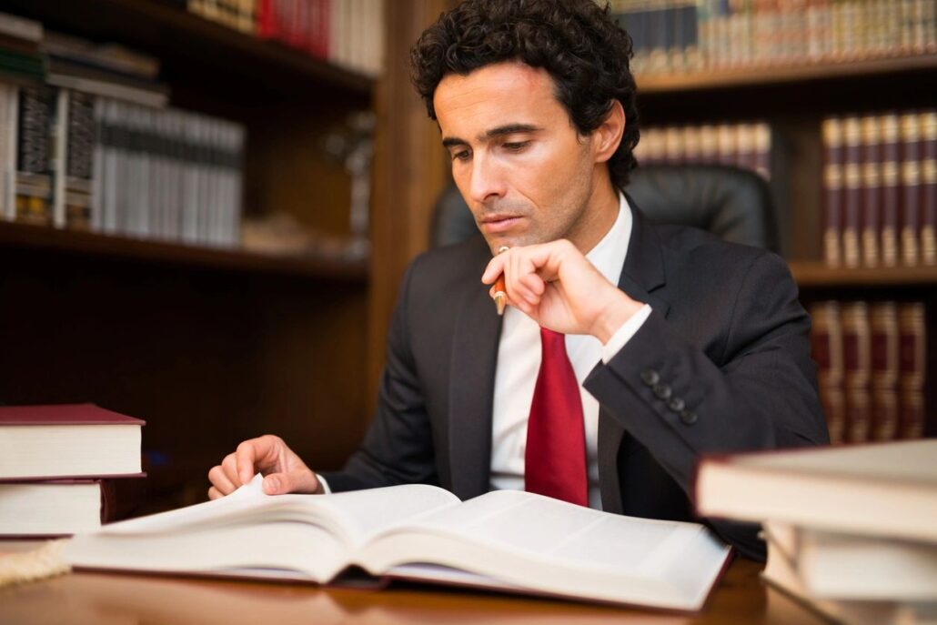 lawyer at desk reviewing documents